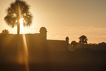 Silhouette of Castillo de San Marcos at sunset in St. Augustine, USA