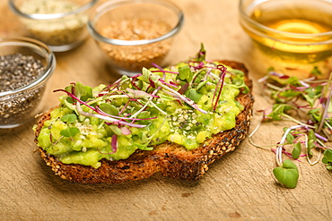 Avocado and bean sprouts on toast