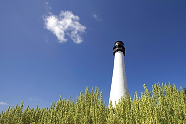 White lighthouse against sky in Key Biscayne, Florida, United States of America