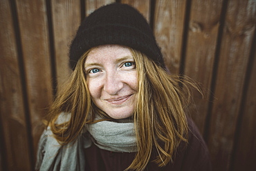 Portrait of smiling young woman wearing woolly hat