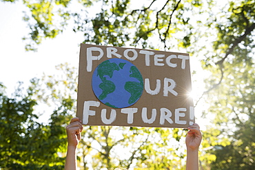 Climate change activist holding sign