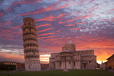 Leaning Tower of Pisa and Piazza dei Miracoli at sunset in Tuscany, Italy