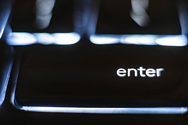 Illuminated 'enter' key on keyboard