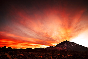 Mount Teide under clouds during sunset in Tenerife, Spain