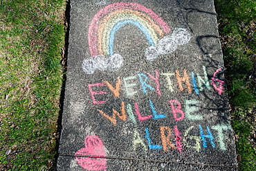 Hopeful message written on sidewalk in chalk during Covid 19 pandemic