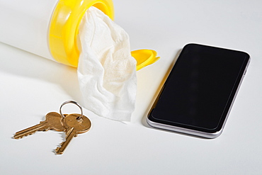 Disinfectant wipes, smart phone and keys