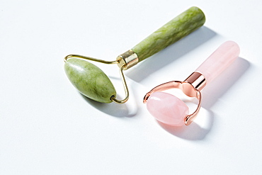 Jade and rose quartz face rollers