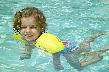 Little girl swimming