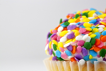 Cupcake with colorful sprinkles