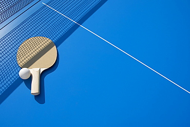 Table tennis paddle and ball