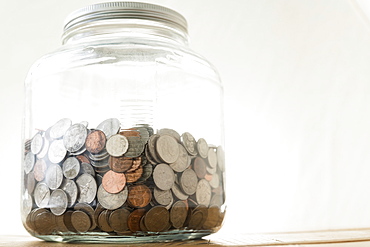 Big jar full of coins 