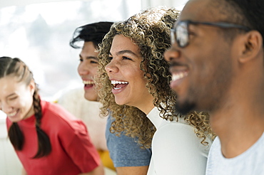 Group of friends laughing together 