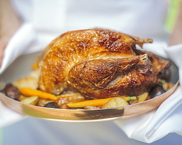 Roast chicken with roasted root vegetables