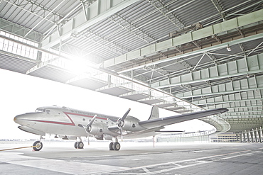 Germany, Berlin, Small airplane in hangar at Tempelhof Airport