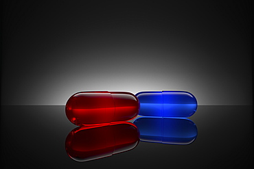 Studio shot of red and blue pills 