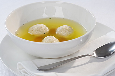 Close up of Matzah ball soup