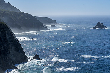 USA, California, Big Sur, Seascape with cliffs and rock formations on sunny day