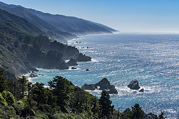 USA, California, Big Sur, Seascape with cliffs and rock formations on sunny day