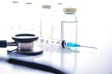 Studio shot of stethoscope, vials and syringe