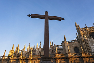 Spain, Seville, Cross against facade of Seville Cathedral