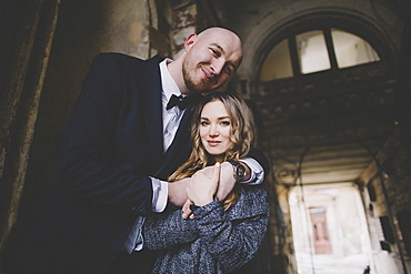 Portrait of smiling newlywed couple