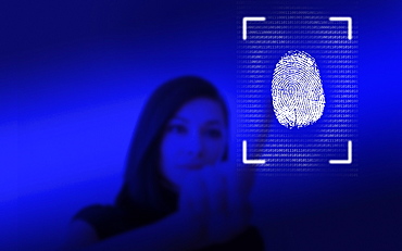 Woman leaving her fingerprint on screen