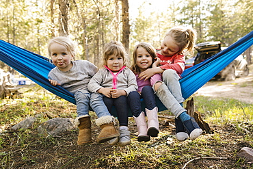 Girls (2-3, 4-5, 6-7) in hammock in Uinta-Wasatch-Cache National Forest