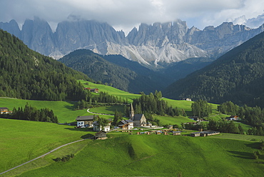 Italy, South Tyrol, Funes, Santa Magdalena, Landscape with village in valley