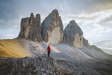 Italy, South Tirol, Sexten Dolomites, Tre Cime di Lavaredo, Man looking at rock formations