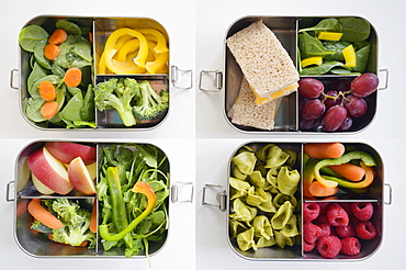 Lunch boxes with fresh vegetables and fruits