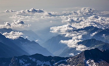 Switzerland, Monte Rosa, Aerial view of Monte Rosa Massif in clouds