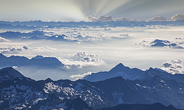 Switzerland, Monte Rosa, Aerial view of Monte Rosa Massif in clouds