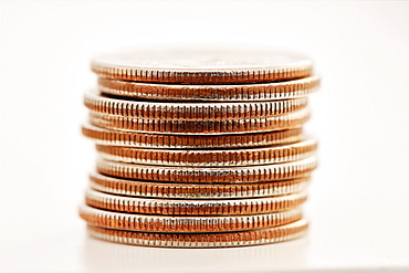 Stack of coins on white background