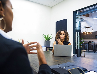 Two businesswomen working in office