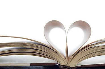 Book with pages folded in heart shape