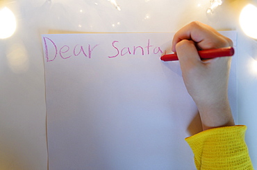 Hand writing letter to Santa Claus