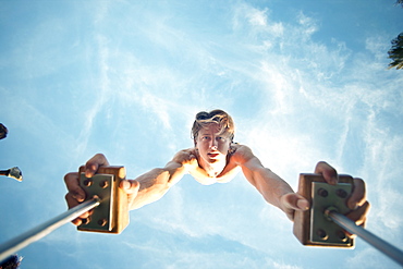 Caucasian man doing handstand