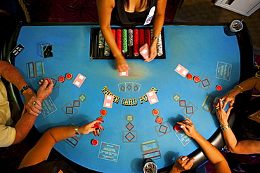 People playing poker in casino