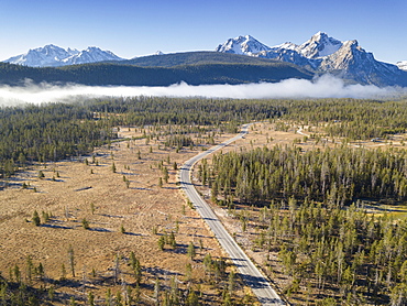 United States, Idaho, Landscape with forests and Sawtooth Mountains in snow