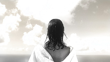 Rear view of woman looking at sea