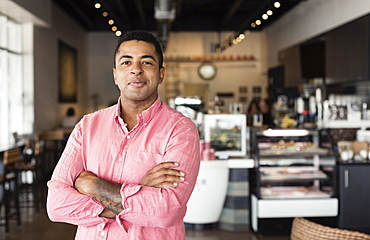 Portrait of young man in coffee shop