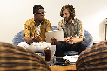 Two men having meeting in coffee shop