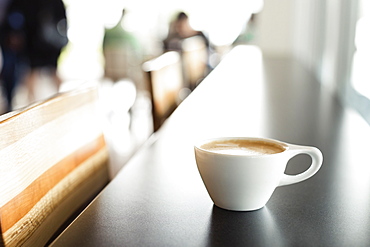 Fresh coffee on counter in coffee shop