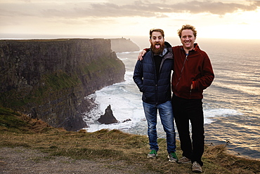 Two male friends on The Cliffs of Moher, The Burren, County Clare, Ireland