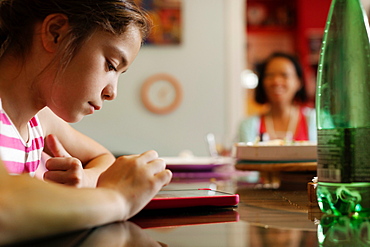 Girl using digital tablet