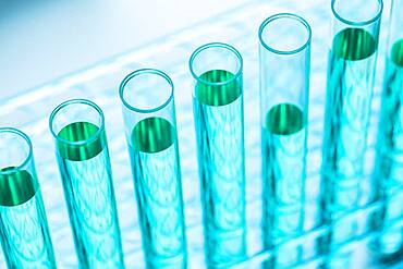 Close-up of test tubes with blue liquid