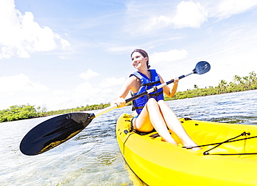 Woman kayaking, Jupiter, Florida