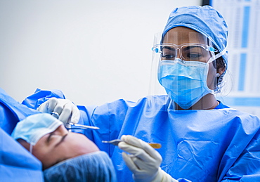 Doctor and patient during surgery