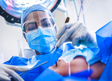 Doctor and patient during surgery