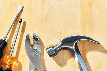 Hand tools on wooden table